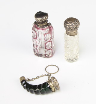 An Edwardian silver mounted scent bottle Birmingham 1900 and 2 others