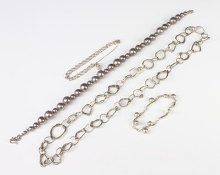 A stylish silver necklace, a ball ditto and 2 bracelets 207 grams