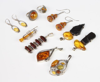 A silver and amber pendant and  minor silver mounted amber jewellery 