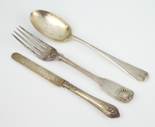 A silver serving spoon Sheffield 1934, a Kings pattern fork and a silver handled knife, weighable silver 170 grams 