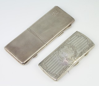 A silver engine turned compact cigarette case/compact 1938 and a Sterling silver spectacle case 201 grams 
