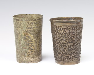 An Indian repousse silver beaker decorated with animals amongst scrolls and a ditto birds amongst flowers 289 grams 