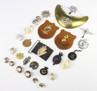A 19th Century Continental gorget together with minor badges