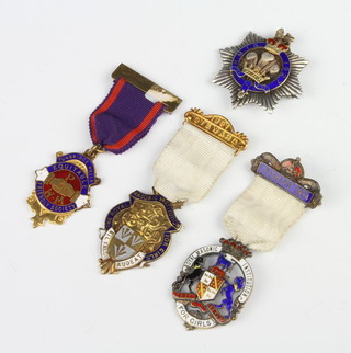 A silver and enamelled Royal Masonic Institute for Girls 1927 jewel, 1 other silver and enamelled jewels and 2 base metal jewels