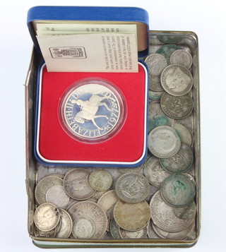 A 1977 Silver Jubilee silver commemorative crown 28 grams, a quantity of pre-47 coinage 225 grams 