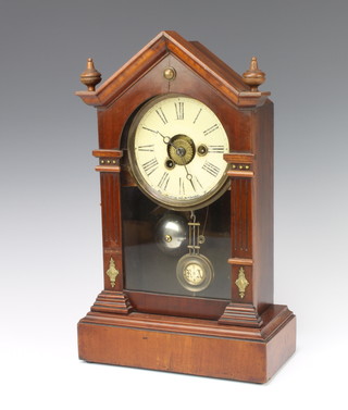 An American striking shelf alarm clock with paper dial contained in a walnut case, complete with pendulum 