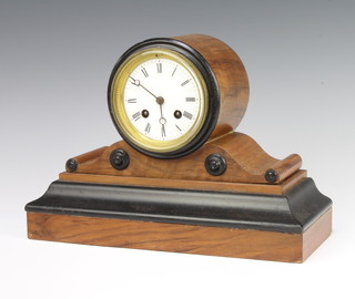 A Victorian 8 day striking mantel clock with enamelled dial and Roman numerals contained in a walnut and ebonised case, complete with pendulum (no key)  