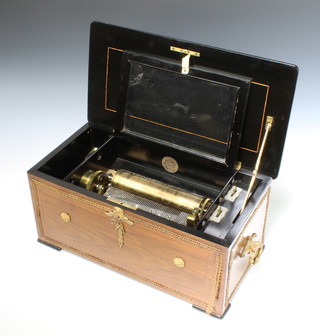 A 19th Century Aim Rivence cylinder musical box with 20cm comb, striking bells and a drum, playing 8 airs, contained in an inlaid rosewood case, with plaque Aim Rivence Fabricant A' Geneva au Monument Brunswick, 21cm x 48cm x 25cm  complete with a winding handle numbered 34943