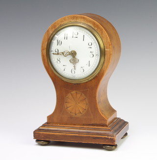 An Edwardian bedroom timepiece with enamelled dial and Arabic numerals contained in an inlaid mahogany balloon shaped case (no key) 