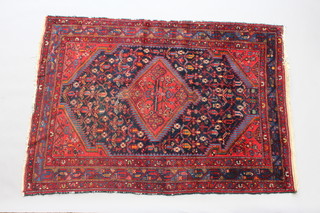 A blue and red ground Ziegler Mahal rug with central medallion 180cm x 129cm