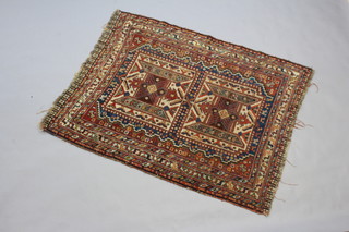 A blue, white and brown ground Caucasian style rug with multi row border 160cm x 121cm 
