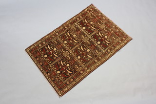 A brown and tan ground Belouche rug formed of 6 rectangular panels 141cm x 94cm  