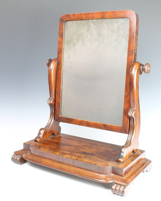 A William IV D shaped dressing table mirror contained in a mahogany swing frame, raised on a shaped base with scroll feet 59cm x 51cm x 27cm 
