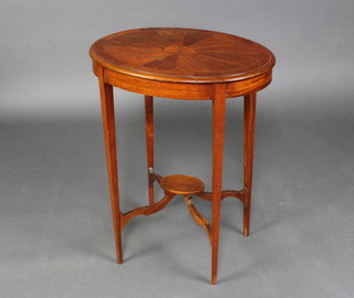 A 19th Century oval inlaid mahogany occasional table the top inlaid satinwood stringing with quadrant decoration raised on square tapered supports with undertier 72cm x 56cm x 42cm 