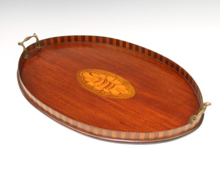 An Edwardian oval inlaid mahogany twin handled tea tray with shell motif to the centre 2cm h x  59cm w x 40cm d 