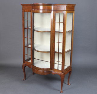 An Edwardian inlaid mahogany bow front display cabinet, the interior fitted shelves enclosed by astragal glazed panels raised on cabriole supports 160cm h x 100cm w x 51cm d 