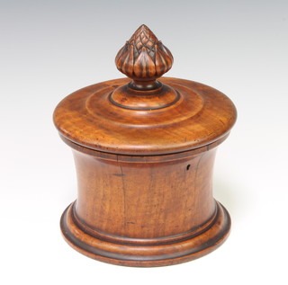 A Victorian circular and waisted mahogany trinket box with hinged lid and carved acorn finial 13cm x 18cm diam. 