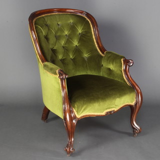 A Victorian mahogany show frame tub back armchair upholstered in green buttoned Dralon, raised on cabriole supports 