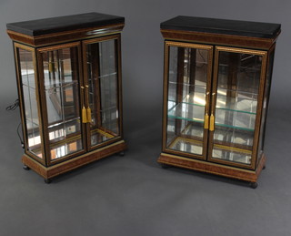 A pair of lacquered finished display cabinets with grey veined marble tops, fitted adjustable shelves 89cm h x 60cm w x 30cm d 