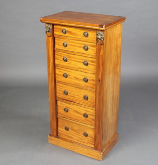 A Victorian mahogany and satinwood Wellington chest of 7 drawers, raised on a platform base 102cm h x 49cm w x 33cm d 