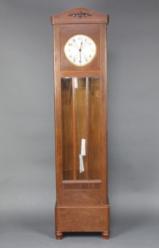 A 1930's Art Deco HAC Westminster chiming longcase clock with 26cm silvered dial with Arabic numerals contained in oak case raised on bun feet 201cm h 