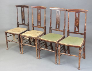 A set of 4 Edwardian inlaid mahogany slat and bar back dining chairs