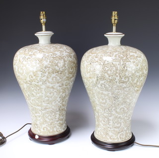 A pair of large Oriental style porcelain table lamps in the form of urns 54cm x 29cm 