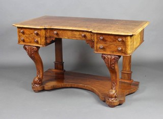 A Victorian figured walnut and cross banded dressing table with quarter veneered top, fitted 1 long flanked by 2 short drawers, raised on cabriole supports with undertier 75cm h x 128cm w x 65cm d 
