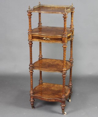 A Victorian walnut and crossbanded 4 tier what-not with pierced brass gallery, raised on turned supports 118cm h x 43cm w x 38cm d 
