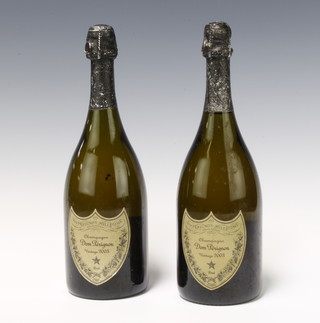 Two bottles of 2003 Dom Perignon champagne 