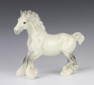 A Beswick figure of a cantering shire horse H975 in rocking horse grey by Arthur Gredington 22.2cm 