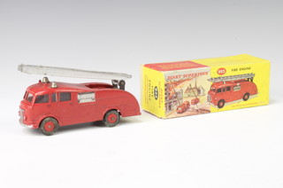 A Dinky SuperToys Fire Engine No 955 ( with glazing and red hubs, boxed.