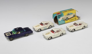3 Corgi Volvo P1800 no 258 from The Saint TV show with black logo, boxed together with a Corgi Man From Uncle Oldsmobile in purple (unboxed). 
