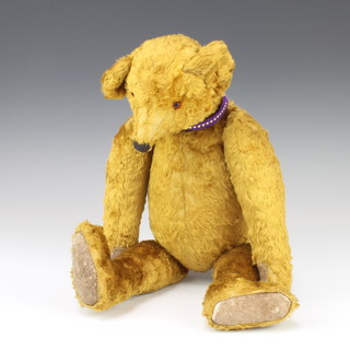 A 19th Century style yellow bear with articulated limbs 45cm 