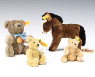 A Steiff miniature teddy bear with articulated limbs 8cm, 1 other 9cm together with a brown Steiff bear 13cm  and 1 other Steiff figure of a pony 13cm 