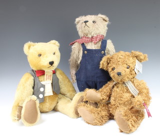 A Herman limited edition yellow teddy bear 49cm, a Rachael Wintle teddy bear 49cm and a Russ Platinum edition bear 42cm 