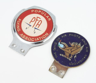 A Guild of Air Pilots and Navigators enamelled radiator badge and 1 other for The Popular Flying Association  
