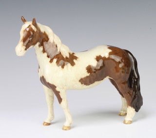 A Beswick figure of a Pinto Pony skewbald brown and white by Arthur Gredington 16.5cm 