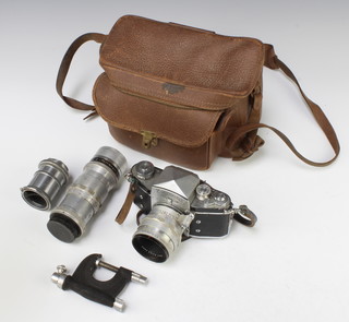 An Exakta Varex VX camera together with a Carl Zeiss Jena Tessar 2:8/50T 3942506 lens and a Meyer-Optik Gorlitz 1480625 Telemegor 1:5.5/180V lens, contained in a leather carrying case 
