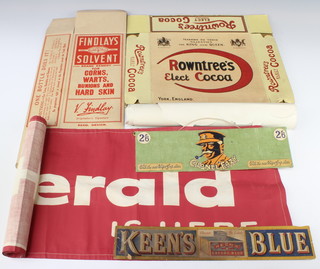 A cardboard shelf sign for Keens Blue 6cm x 37cm (some damage to the edges), a hanging sign for Colonel Eazy Pipe Stems 10cm x 32cm, a rectangular cloth banner for Your Daily Herald is Here 119cm x 29cm, a retail fruit trade poster Eat More Fruit 86cm x 38cm (creased), a flat packed cardboard shop display box Findlays Solvent 33cm x 3cm x 14cm, do. Rowntree's Elect Coco 27cm x 28cm x 9cm 