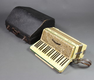 A Hohner accordion with 120 buttons, complete with carrying case 
