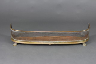 A Regency brass and polished steel fender raised on hoof supports 22cm h x 107cm x 28cm