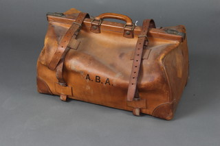 A light brown leather Gladstone bag with brass mounts 33cm x 38cm x 64cm 