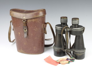 A pair of Ross 7x50 binoculars marked no.109193 Stepnite complete with leather carrying case 