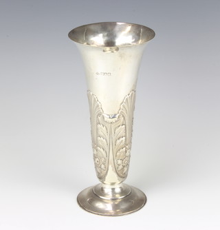 An Edwardian repousse silver flared neck vase with scrolls and flowers, London 1906, 288 grams, 22.5cm 