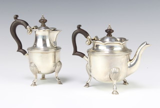An Edwardian silver batchelor's coffee pot Dublin 1908 and a ditto teapot, 569 grams gross