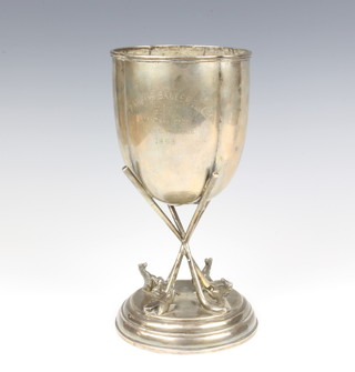 A 19th Century Continental silver presentation trophy raised on polo sticks with circular base 905 grams, 25.5cm