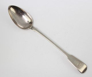 A William IV silver fiddle pattern basting spoon London 1835 with chased armorial, maker William Eley & William Fearn 133 grams 