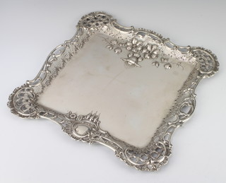 A 19th Century Continental repousse and pierced silver square tray decorated with flowers and scrolls 812 grams, 34 cm