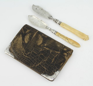 A silver mounted crocodile wallet and 2 ditto butter knives 